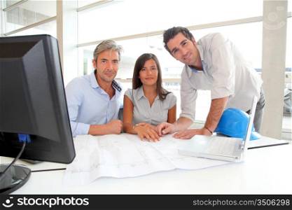 Team of architects working in office