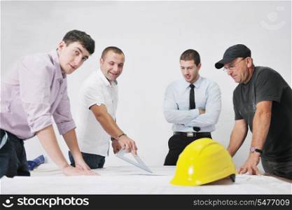 Team of business people in group, architect and engeneer on construciton site check documents and business workflow on new building