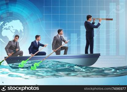 Team of businessmen in teamwork concept with boat. The team of businessmen in teamwork concept with boat