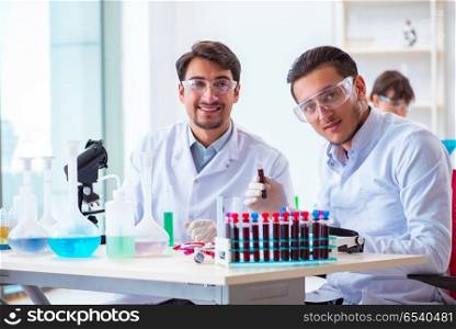 Team of chemists working in the lab