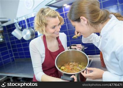 team of female chefs at restaurant kitchen