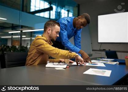 Team of managers, discussion in IT business office. Professional teamwork and planning, group brainstorming and corporate work. Team of managers, discussion in IT business office