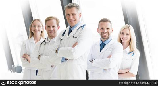Team of medical doctors. Successful team of medical doctors are looking at camera