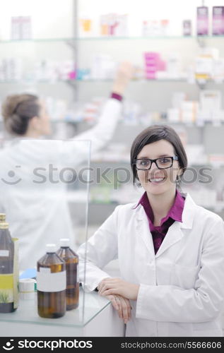 team of pharmacist chemist woman group standing in pharmacy drugstore