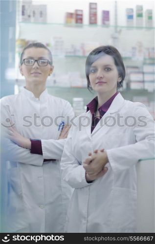 team of pharmacist chemist woman group standing in pharmacy drugstore