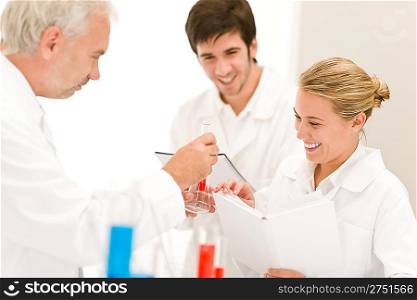 Team of scientists in laboratory - medical research, flu virus vaccination