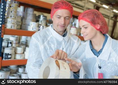 team of workers at duct tape factory