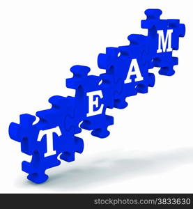 Team Puzzle Showing Partnership, Teamwork And Unity
