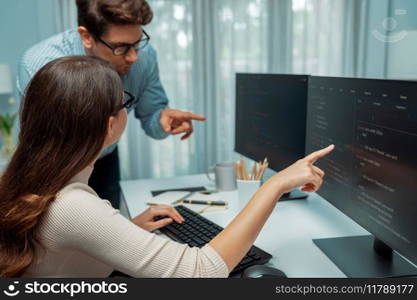 Team skilled developers program thinking newest coding creative website planning software project on two pc screen, comparing with typing full stack data analyzing prompt design at office. Postulate.. Team developers program thinking newest coding creative website. Postulate.