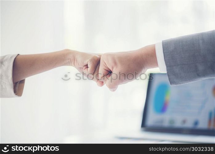 Teamwork business concept.Close up view of group of coworkers join hand together during their meeting