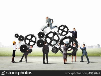 Teamwork concept. Conceptual image of businessteam working cohesively. Interaction and unity