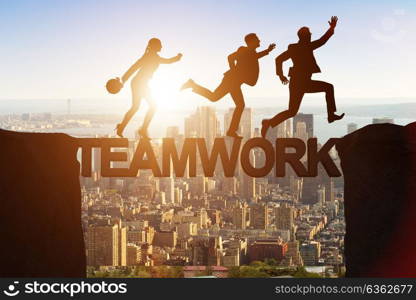 Teamwork concept with business people crossing bridge