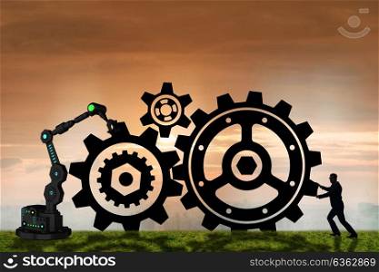 Teamwork concept with businessman and cogwheels