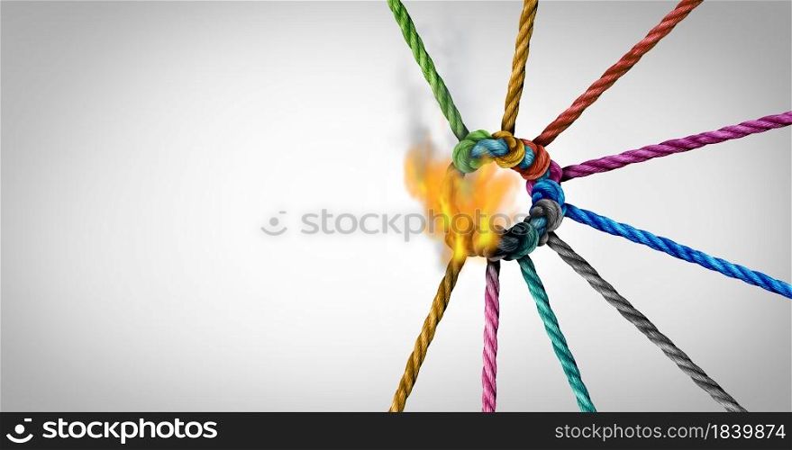 Teamwork crisis and disconnect concept as a business metaphor for losing a partnership as diverse ropes connected together being torn apart with burning flames as a corporate symbol for cooperationwith 3D render elements.