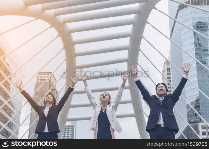 Teamwork Together Concept. Group of diversity people high five on air to greeting power of tag team. Multiethnic people group working togetherness. Volunteer collaboration in Business Team success