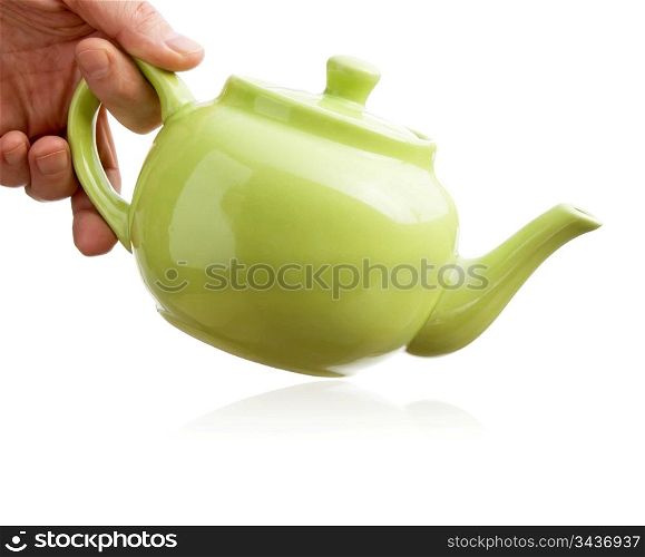 teapot in hand isolated on white background