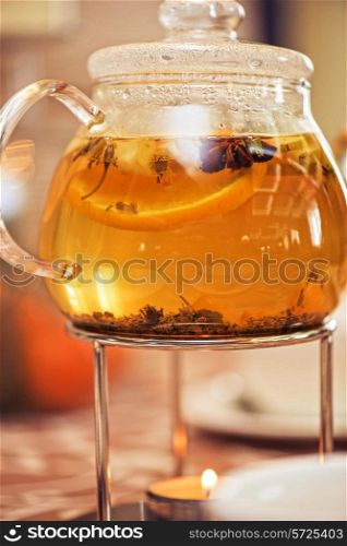 teapot of herbal tea on table