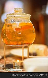 teapot of herbal tea on table . teapot of herbal tea