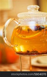 teapot of herbal tea. teapot of herbal tea on table
