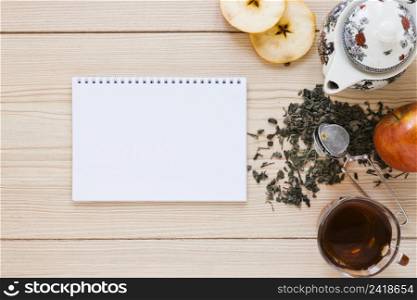 teapot with apple notebook mock up