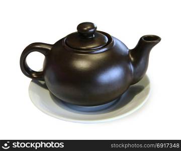teapot with tea on the saucer isolated. teapot with tea on the saucer isolated on the white