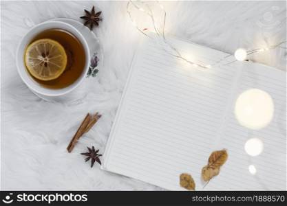 teatime white fur plaid with notebook. Resolution and high quality beautiful photo. teatime white fur plaid with notebook. High quality and resolution beautiful photo concept