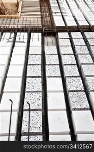 Technical detail of building operations: floor. Materials: polystyrene, steel bars, concrete