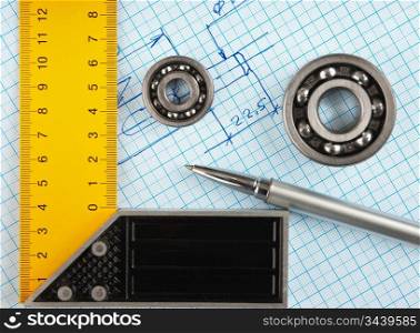 Technical drawing and setsquare with bearing on graph paper