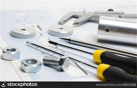 technical drawings with tools and parts