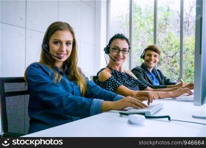 Technical support operator with headset working at laptop and computer, Business people talking on telephone with headset at office for customer help service concept