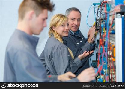 technician and apprentices in large data center