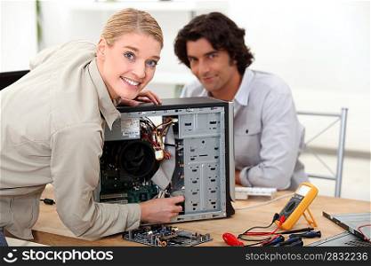 Technician fixing a computer