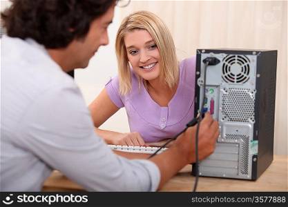 Technician fixing a computer