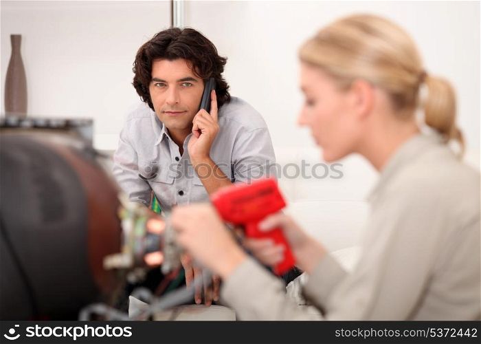 Technician fixing a television