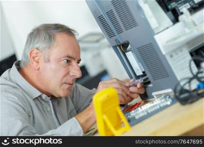 technician specializes in a large printer