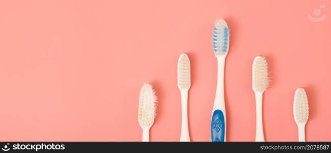 Techniques for storing toothbrushes and cleaning brushes after use to reduce the accumulation of germs and bacteria