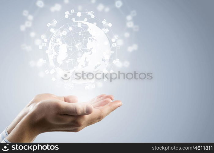 Technologies connecting the world. Global connection concept with digital planet in hands