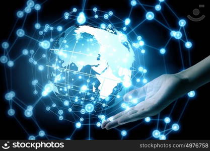 Technologies connecting the world. Global connection concept with digital planet in hands