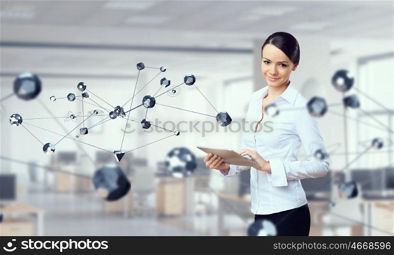 Technologies for work and connection. Attractive elegant woman with tablet pc in modern interior. Mixed media