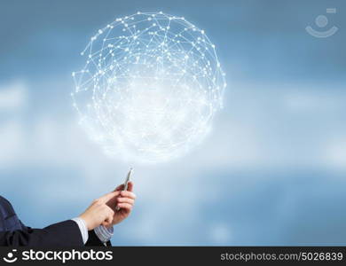 Technologies that conncet the world. Businessman holding in hand mobile phone with global connection concept