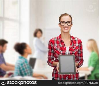 technology, advertisement, education and people concept - smiling girl in eyeglasses with blank tablet pc screen