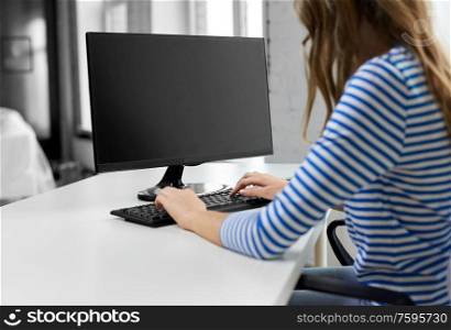 technology and education concept - close up of teenage girl with computer at home. close up of teenage girl with computer at home
