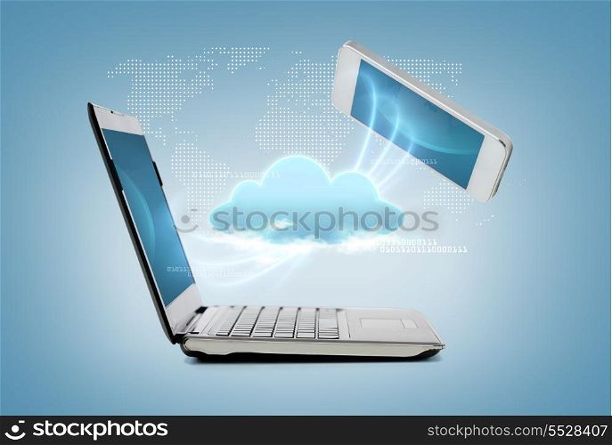 technology and internet concept - smartphone and laptop connecting