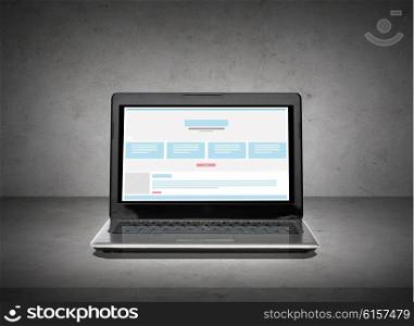 technology and object concept - laptop computer with web page design template on screen. laptop computer with web design template on screen