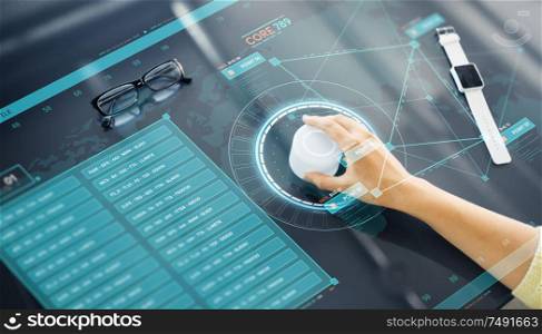 technology and people concept - close up of woman&rsquo;s hand using rotary control knob on interactive panel with virtual data hologram. hand with control knob on interactive panel