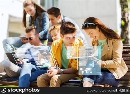 technology and people concept - group of happy teenage students or friends with tablet pc computers outdoors over virtual screens. happy students or friends with tablet pc outdoors