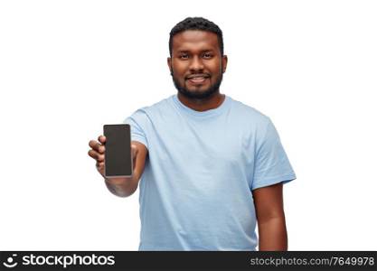 technology and people concept - happy young african american man showing smartphone over white background. happy african american man with smartphone