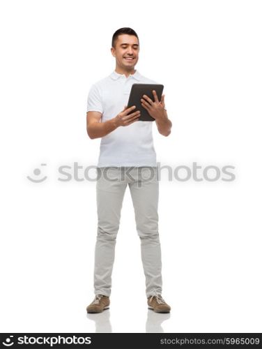 technology and people concept - smiling man with tablet pc computer. smiling man with tablet pc computer