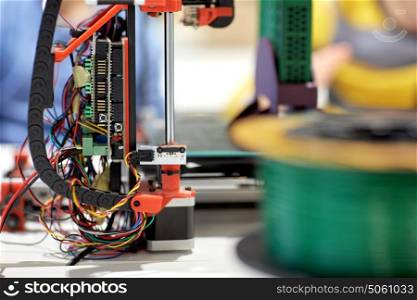 technology and science concept - 3d printer at robotics school. printer 3d at robotics school