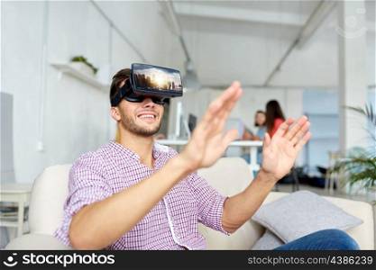 technology, augmented reality and people concept - happy man with singapore city on virtual headset screen at office. happy man with virtual reality headset at office. happy man with virtual reality headset at office